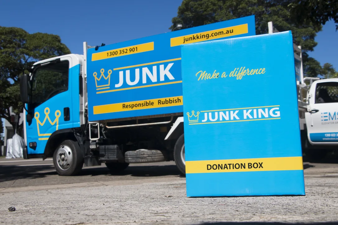 Junk King donation box with rubbish removal truck