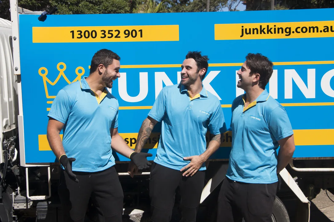 Junk King Sydney team in front of a branded rubbish removal truck