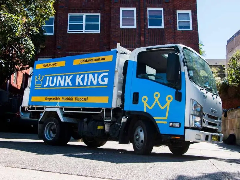 Junk King rubbish removal truck in a Sydney laneway