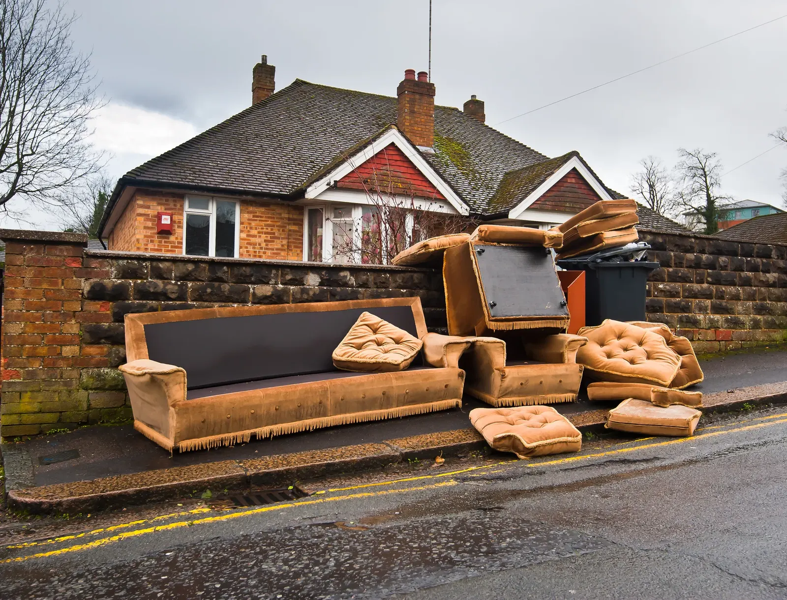Household rubbish waiting for pickup near the kerb